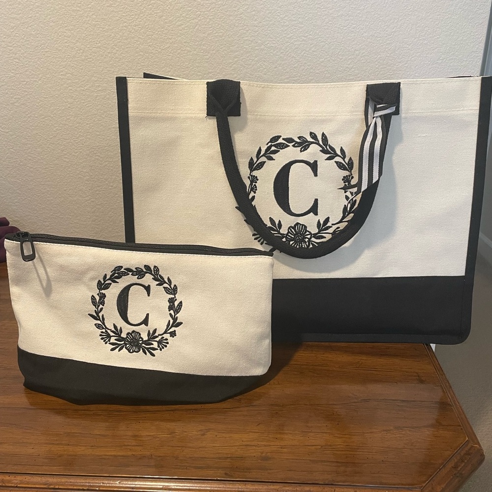 Canvas “C” tote bag with small canvas bag. White and black. New, never used.